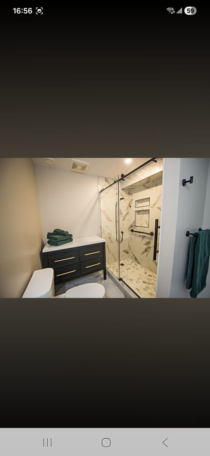 Marble Shower with Black Vanity